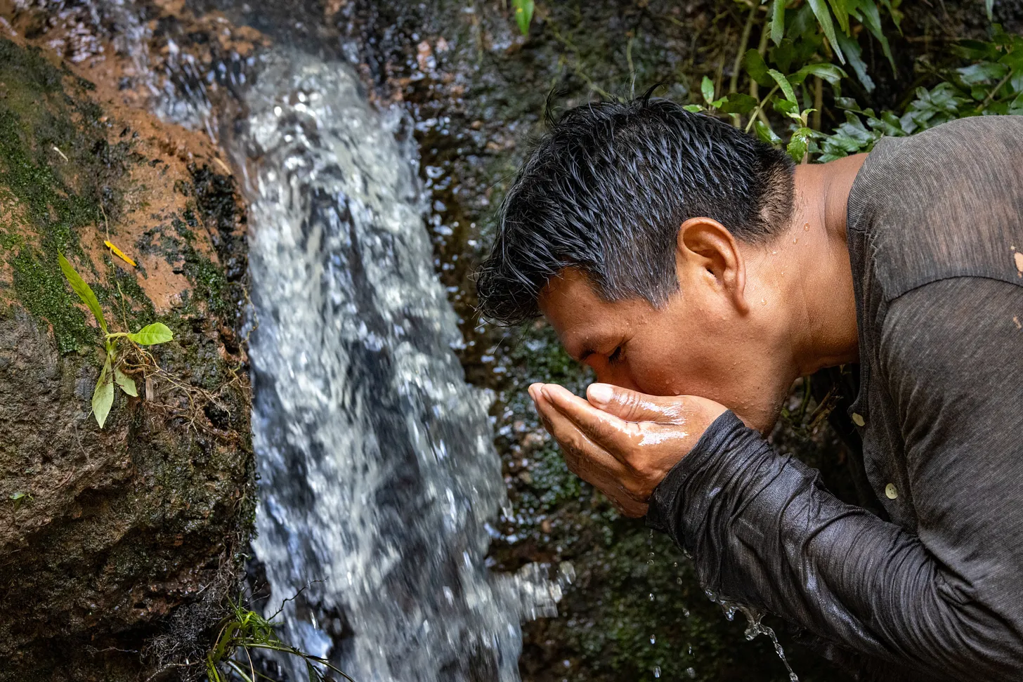 A hand touching water